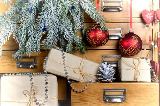 Christmas gifts in the drawer of a cabinet