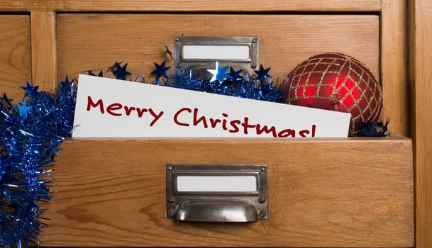 Christmas gifts in the drawer of a cabinet