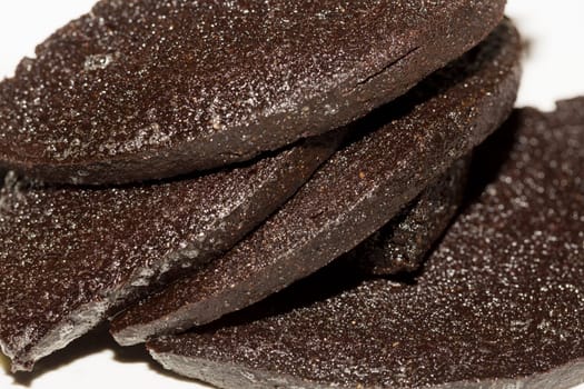 Swedish Blood Pudding Close up on white plate.