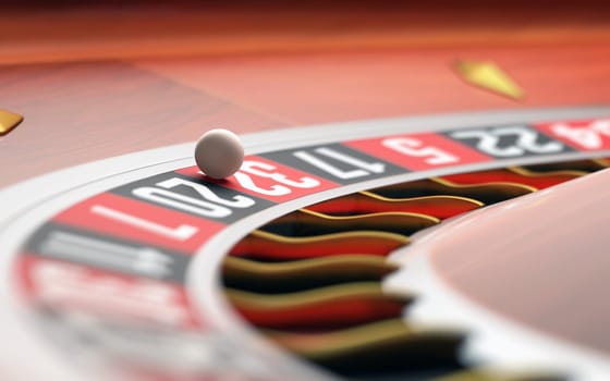 Playing roulette in the casino. Depth of field with focus on the ball.