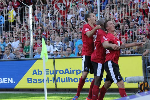 Schuster and Guide celebrate Max Kruse's hit