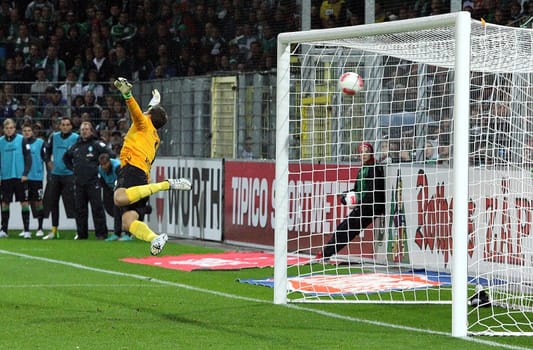 Bremen's goalkeeper Sebastian Mielitz is beaten,Jonathan Schmid's free-kick lands in the corner of the goal for a 1-0 lead.