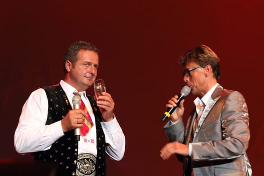 Norbert Rier (left) with moderator Hansi Vogt