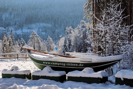 Snowy boat at Titisee