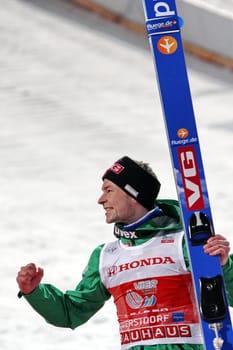 Norwegian Anders Jacobsen has won the opening jump of the Four Hills Tour
