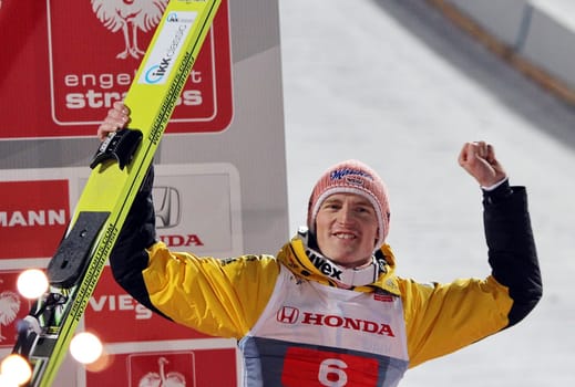 Severin Freund cheers on third place