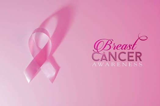 Breast cancer awareness pink ribbon and background with text and clipping path to cut and paste on a design.