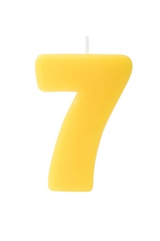Yelllow birthday candle in the form of the number seven on white background