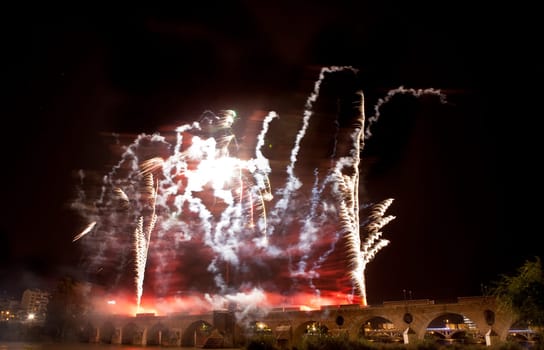 People observing the Puente de Palmas fireworks at San Juan festivity night