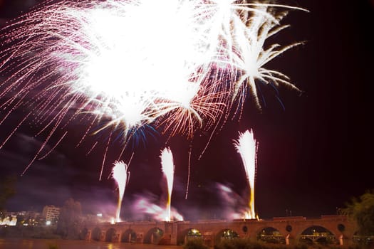 People observing the Puente de Palmas fireworks at San Juan festivity night