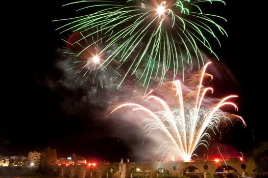 People observing the Puente de Palmas fireworks at San Juan festivity night