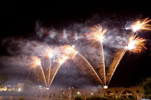 People observing the Puente de Palmas fireworks at San Juan festivity night