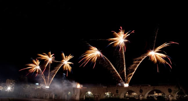People observing the Puente de Palmas fireworks at San Juan festivity night