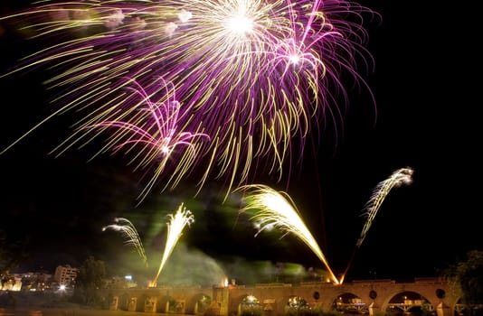 People observing the Puente de Palmas fireworks at San Juan festivity night