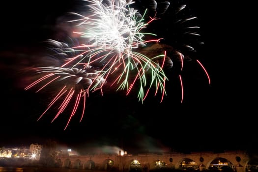 People observing the Puente de Palmas fireworks at San Juan festivity night