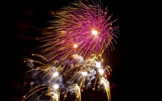 People observing the Puente de Palmas fireworks at San Juan festivity night
