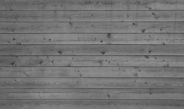 Grey board wall with horizontal boards as a rustic natural background
