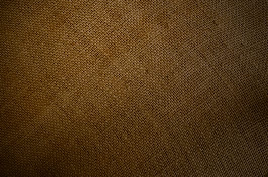 Coarse brown fabric of a jutesack as a rustic background