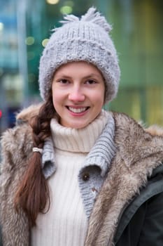 Portrait of an attractive, young woman in the city