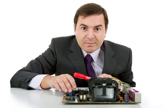 Computer Engineer working in a motherboard, isolated