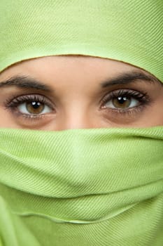 young woman with a veil, close up portrait, studio picture