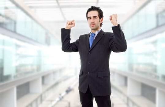 businessman with open arms winning at the office