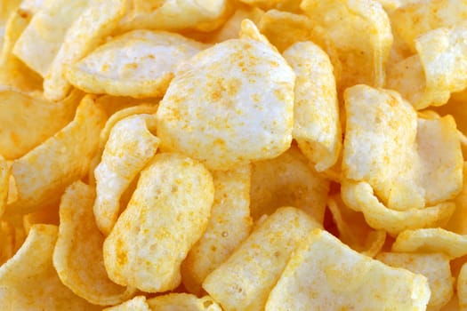 delicious potato chips are photographed close up