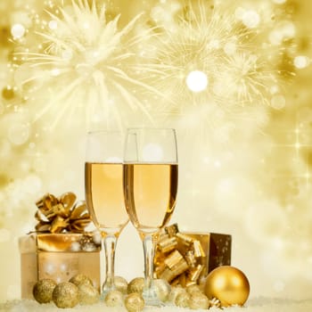 Glasses with champagne against fireworks and clock close to midnight