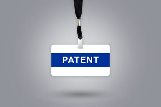 patent on badge with grey radial gradient background