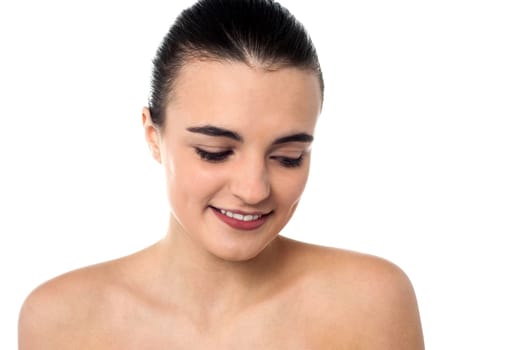 Smiling shot of a sensual shy girl