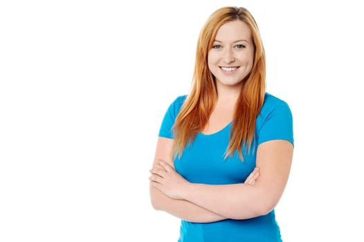 Young lady posing with arms crossed