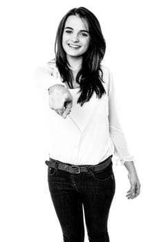 Black and white image of a charming teenager