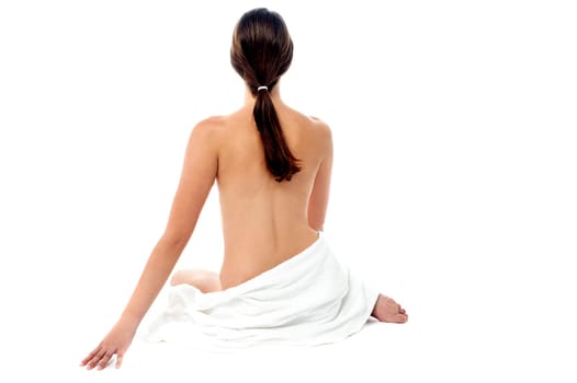 Portrait of a young topless woman