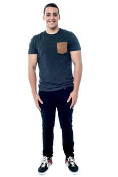 Teenager boy posing, full length portrait.