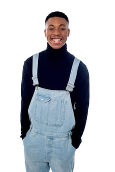 Smiling guy posing in fashionable outfit