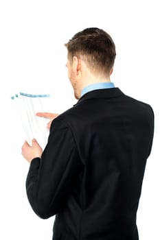 Young executive reading documents