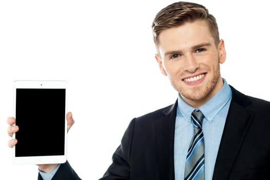 Young employer showing new tablet device