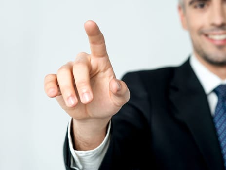 Executive selecting an option on the virtual screen