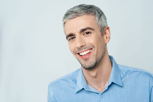 Handsome male model smiling out loud
