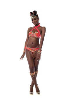 Full length pose a female samba dancer, legs crossed.