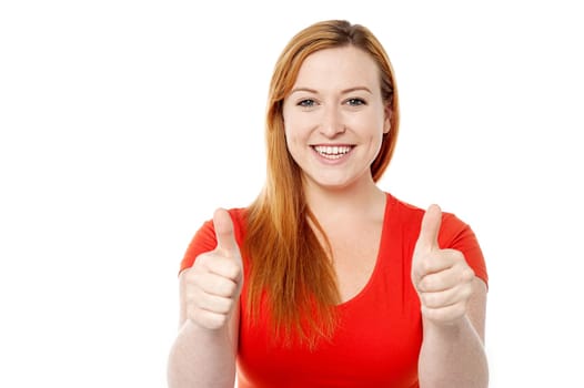 Pretty lady showing double thumbs up
