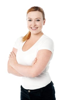 Charming woman posing with arms crossed