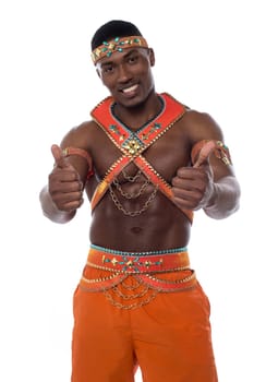 Young isolated male dancer showing double thumbs up