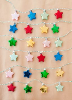 Colorful stars lined up for Advent on cord