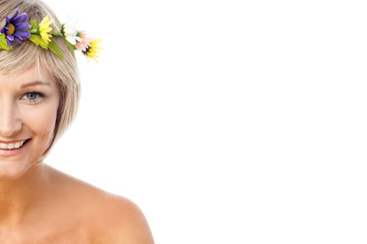 Cheerful woman wearing head flower crown