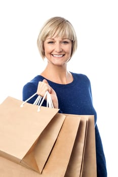 Pretty woman holding shopping bags