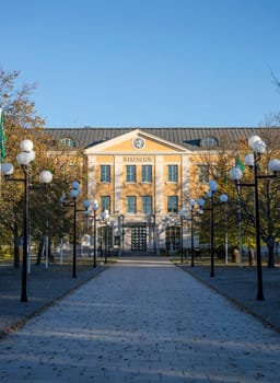 City Hall in Umeå, Sweden with a clear blue sky behind it.