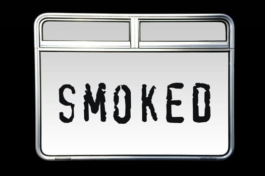 An abstract metallic shiny train window with the inscription Smoked.