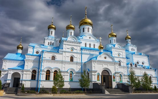 monastery in the town of Pochaev on the sky background