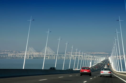 Driving along car the Vasco da Gama Bridge, the the longest one in Europe